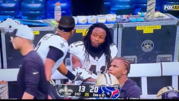 Saints running back Alvin Kamara and quarterback Jameis Winston (left)
